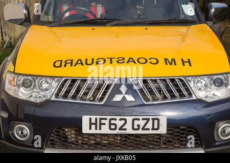 Coastguard sign with mirror writing on hood of vehicle, England, UK Stock Photo