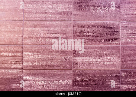 Wall tiled with massive red tiles Stock Photo