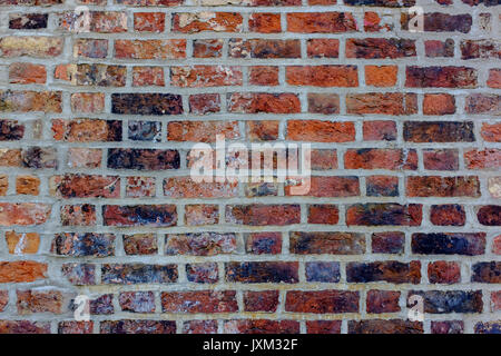 Red brick wall, straight on. Stock Photo