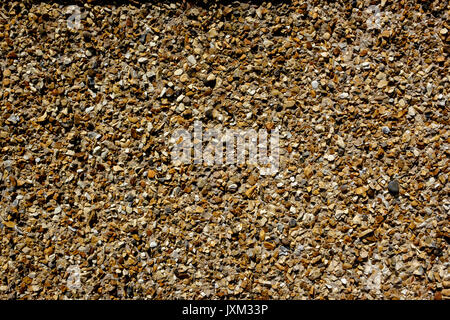 Close up of a pebble dashed wall on a 1930's suburban house Stock Photo