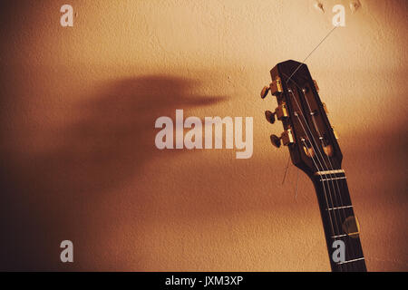 Musical instrument - Front view very rare vintage acoustic guitar folk  country isolated on a orange background Stock Photo - Alamy