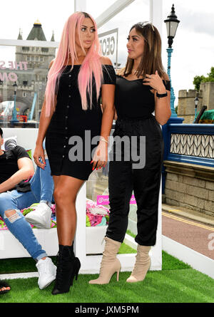 Sophie Kasaei and Chloe Ferry (left) from the cast of Geordie Shore attending the photocall to launch series 15 of the show in London. Stock Photo