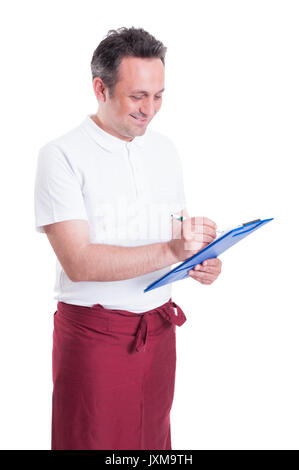 Successful butcher with clipboard taking notes and smiling on white background Stock Photo