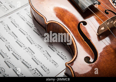 Viola on the sheets of music Stock Photo
