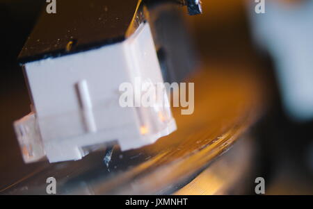 Detail shot of a record player with record playing Stock Photo