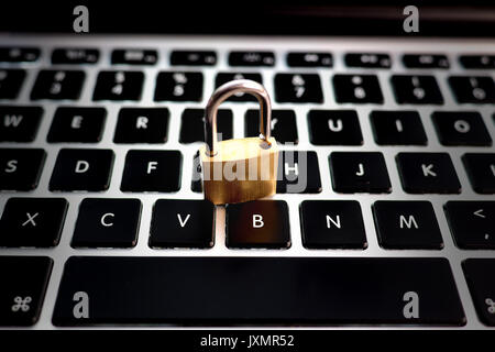 Lock on computer keyboard Stock Photo