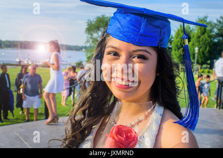 Portrait of teenage girl wearing graduation cap Stock Photo