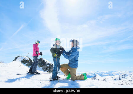 Father helping son, Hintertux, Tirol, Austria Stock Photo