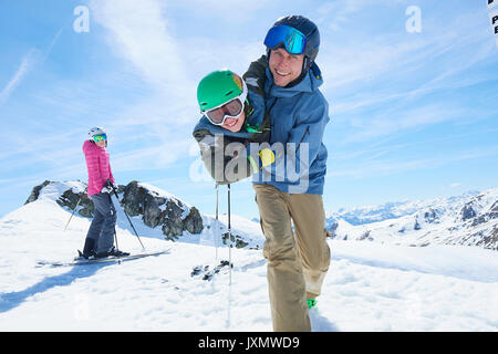 Father and son playing, Hintertux, Tirol, Austria Stock Photo