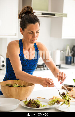Woman preparing salad lunch Stock Photo