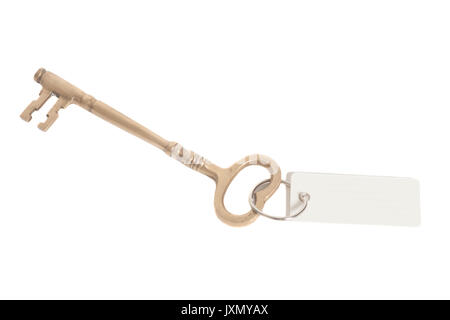 Antique golden key and blank tag isolated on white Stock Photo