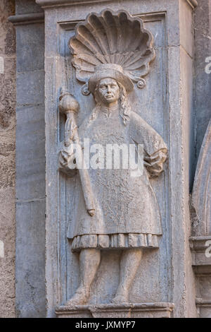 Granada, SPAIN - 16 february 2013: Relief of Macebearers in the renaissance facade of access to the royal chapel, Granada, Andalusia, Spain Stock Photo