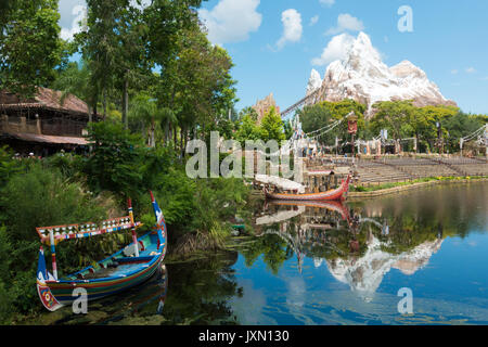 Looking towards Expedition Everest over the Rivers of Light lake in Disneys Animal Kingdom Theme Park, Orlando, Florida. Stock Photo