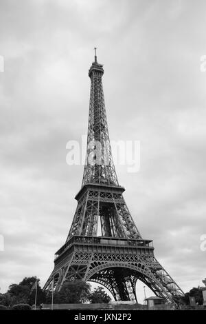 The Eiffel Tower in Paris as it is seen from the River Seine when on a boat trip photographed in black and white Stock Photo