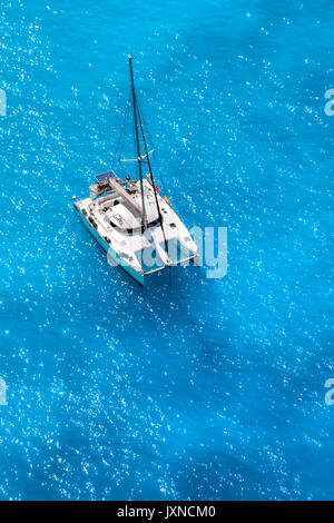 White luxury yacht against azure sea Stock Photo