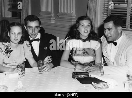 Student Life, Senior Banquet and Dance, Ira Singer, Theodore DeBois, Ira Singer and Ted Debois sitting at a table with their dates during the Senior Banquet and Dance held at the Southern Hotel, 1947. Stock Photo