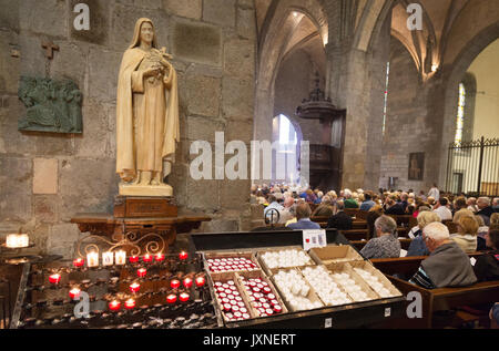 St Malo cathedral - a church service in the interior of Cathédrale Saint-Vincent-de-Saragosse de Saint-Malo, St Malo, Brittany France Europe Stock Photo