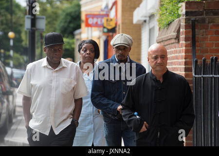 The family of Rashan Charles, including his father Esa (second right) arrive at Poplar Coroner's Court, in east London, where an inquest has opened into the death of the 20-year-old. Stock Photo