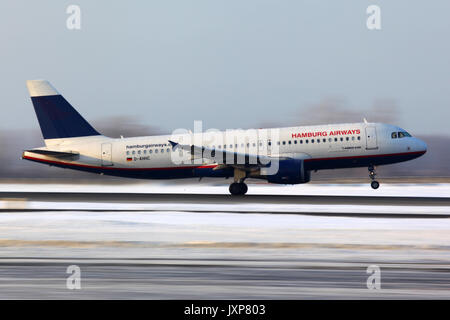 Domodedovo, Moscow Region, Russia - February 11 2012: Hamburg Airlines Airbus A320 D-AHHC taking off at Domodedovo international airport. Stock Photo