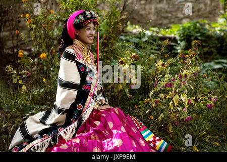 A girl dressed in national costume in Badan County,Sichuan province,China Stock Photo