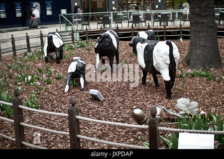 View of Concrete Cows on display at Midsummer Place shopping centre, Milton Keynes. Stock Photo