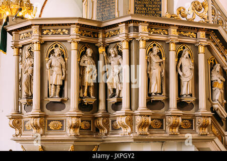 Riga, Latvia - July 2, 2016: Interior Of The Riga Dom Dome Cathedral Church. Decorative Elements, Statues On The Pulpit. Indoor Stock Photo