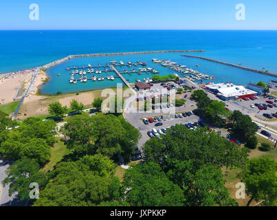 Aerial view of Lexington Michigan on Lake Huron showing a man made harbor and how it protects a marina from wind and waves Stock Photo