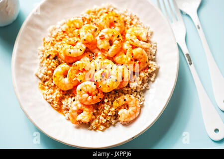 Prawns in sweet chilli sauce with barley Stock Photo
