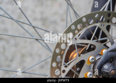 Front brakes on a modern mountain bicycle. Brake disc Stock Photo