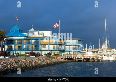 Oakland, California waterfront marina buildings and boats at sunset. Jack London Square area Stock Photo