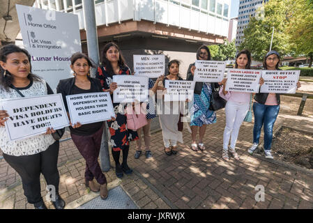 London, UK. 16th August 2017. Indian women came to Lunar House in Croydon to protest at the the Home Office's failure to protect the human rights of migrant wives brought to the UK under the spousal visa system. Wives have to be sponsored by their husbands to receive a visa, and hundreds of husbands have abused the position of power this gives them, in some cases keeping wives in conditions that amount to modern slavery and in hundreds of cases callously disposing of their wives by writing to the Home Office claiming they are separated. Credit: Peter Marshall/Alamy Live News Stock Photo