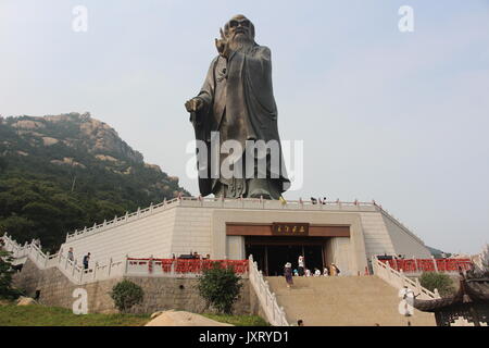 Qingdao, Qingdao, China. 17th Aug, 2017. Qingdao, CHINA-16th August 2017: (EDITORIAL USE ONLY. CHINA OUT).The 50-meter-tall world's largest Laozi statue can be seen at Lao Mountain in Qingdao, east China's Shandong Province. Laozi, also known as Lao-Tzu, was an ancient Chinese philosopher and writer. He is known as the reputed author of the Tao Te Ching, the founder of philosophical Taoism, and a deity in religious Taoism and traditional Chinese religions. Credit: SIPA Asia/ZUMA Wire/Alamy Live News Stock Photo