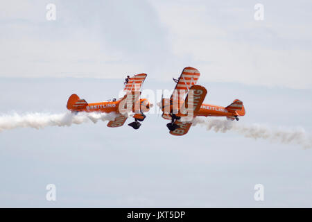 Eastbourne, UK. 17th Aug, 2017. Crowds on day 1 of the Eastbourne Airshow enjoyed flying displays by the Breitling wing walkers. Eastbourne, East Sussex, UK Credit: Ed Brown/Alamy Live News Stock Photo