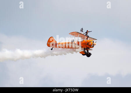 Eastbourne, UK. 17th Aug, 2017. Crowds on day 1 of the Eastbourne Airshow enjoyed flying displays by the Breitling wing walkers. Eastbourne, East Sussex, UK Credit: Ed Brown/Alamy Live News Stock Photo