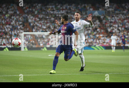 Sergio Ramos of Real Madrid and Luis Suarez of FC Barcelona during the ...