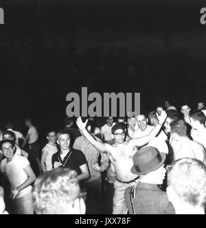 Student Life, Alumni Memorial Residence, Candid photograph, Students in dorm quad, 1959. Stock Photo