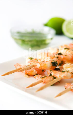 Shrimp skewers isolated on white background Stock Photo