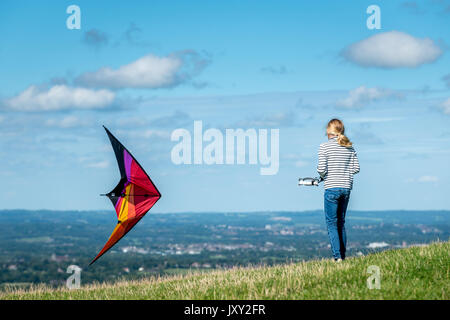 Flying kites on the South Downs near Brighton Stock Photo