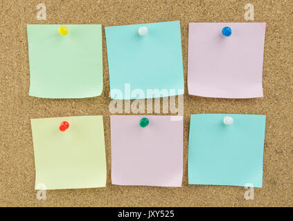 Sticky note on cork board background Stock Photo