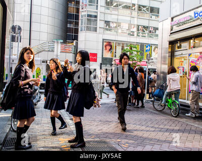 Japanese girls wearing clothes and make-up in the Yamamba / ganguro gal  fashion, Shibuya, Tokyo, Japan Stock Photo - Alamy