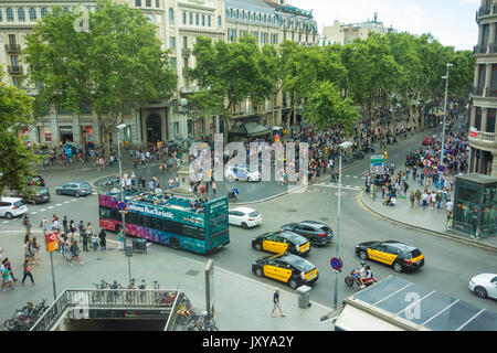 Barcelona, Spain. July 01, 2017:Crowd of anonymous people walking , police car and taxis , police car and taxis on the Rambla of Barcelona Stock Photo