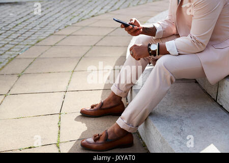 pink suit with brown shoes