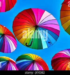 Multi-colored umbrellas background. Street decoration in Sochi, Adler, Russia Stock Photo