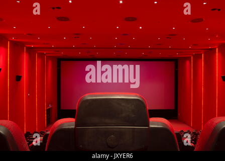 Empty, red movie theater. Movie starts Stock Photo