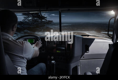 The truck driver on the night road. business trip Stock Photo