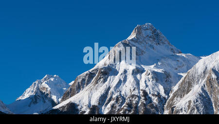 Snow on mountain range Stock Photo