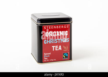 Fairtrade tea. A tea caddy of Steenberg's Organic Christmas Tea, a fairtrade product of spiced black tea. On a white background Stock Photo