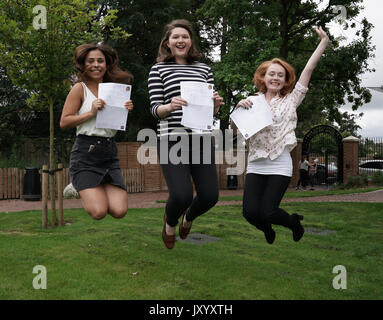 Students (left to right) Georgia Sklinidjis (who received 3 A's), Katie Bonner (who received 3 A*'s) and Ciara Burke (who received 3 A's) after collecting their A-level results at St Anne&Otilde;s Catholic High School for Girls in north London. Stock Photo