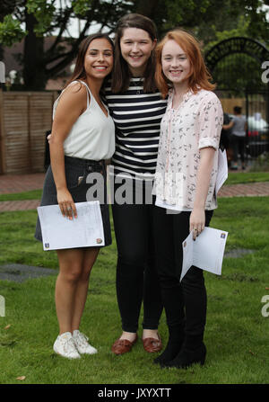 PLEASE NOTE CONFIDENTIAL DETAIL IN PHOTO PIXELATED BY PHOTOGRAPHER : Students (left to right) Georgia Sklinidjis (who received 3 A's), Katie Bonner (who received 3 A*'s) and Ciara Burke (who received 3 A's) after collecting their A-level results at St Anne's Catholic High School for Girls in north London. Stock Photo