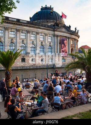 Late summer afternoon at Strandbad Mitte outdoor beach bar beside Spree River on Museum Island (Museumsinsel) in Mitte, Berlin, Germany Stock Photo